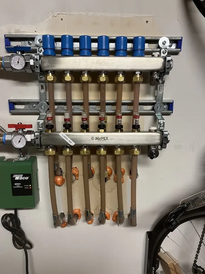 Plumber performing Gas Line Installation at a residential property in Cherokee